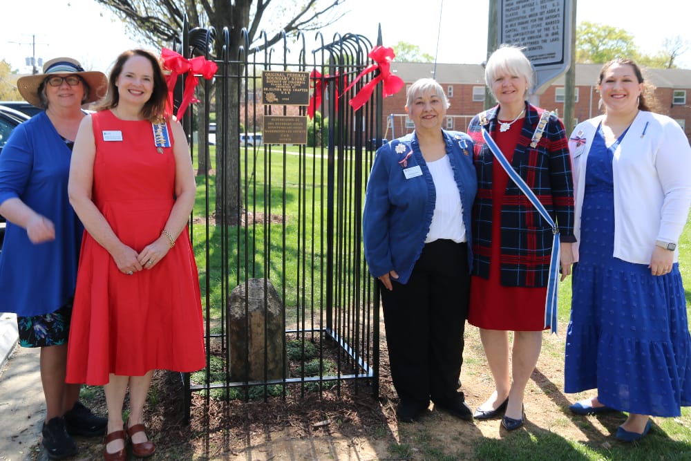 Historic boundary stone gets new plaque and fence at Arlington-Fairfax line | ARLnow.com