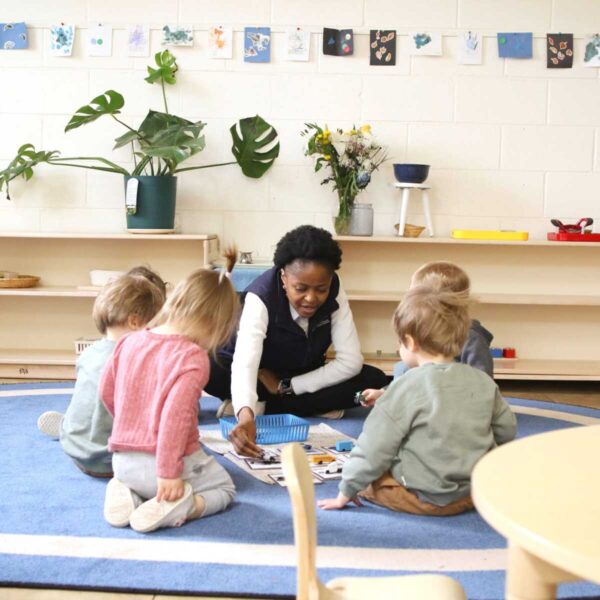 Circle time brings the classroom community together for group lessons led by experienced, certified Montessori teachers.