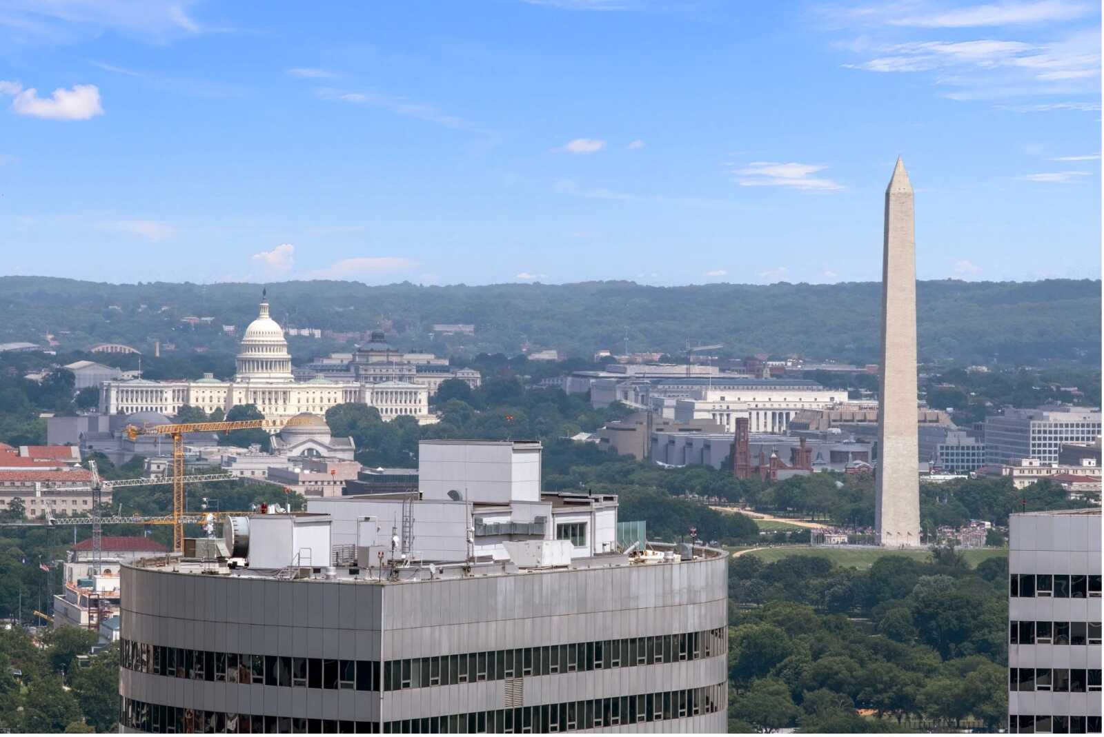 Pierce rooftop includes DC views, pool, grills, and fireplace