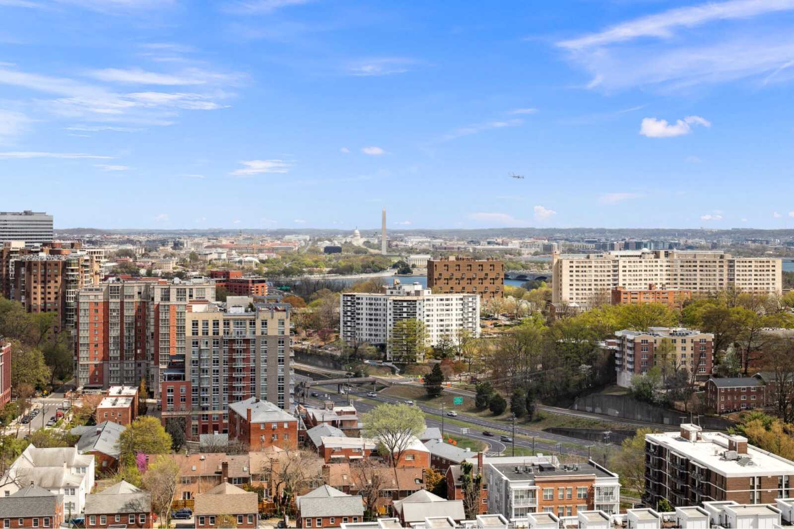 The Odyssey rooftop includes amazing DC views, a pool, grills, and the fitness center