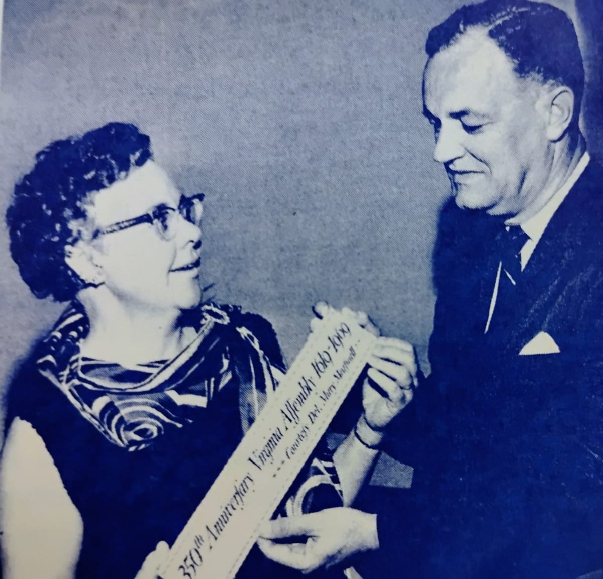 Del. Mary Marshall and Gov. Mills Godwin, 1969 (via Charlie Clark Center for Local History) | ARLnow Woman wearing glasses accepts a ceremonial sash from a man in a suit at an awards event.