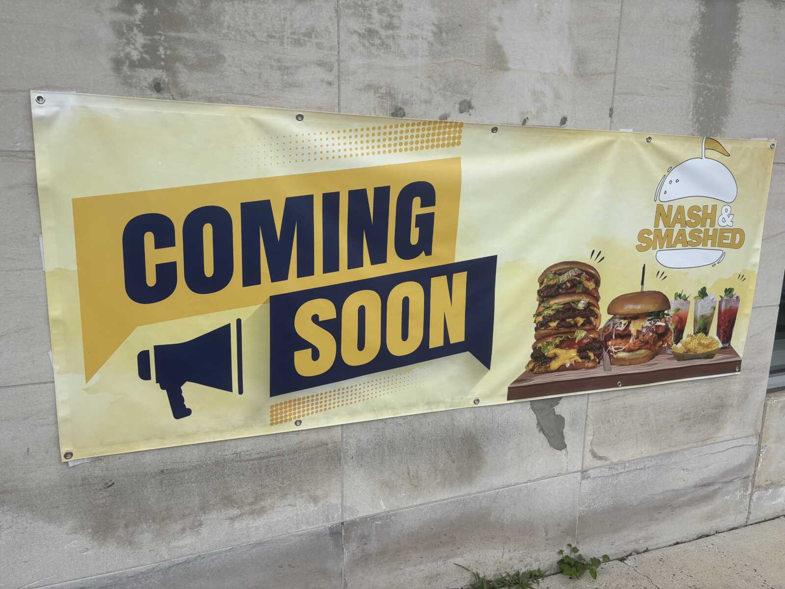Banner announcing 'COMING SOON' for Nash & Smashed, featuring stacked burgers and drinks on the right.