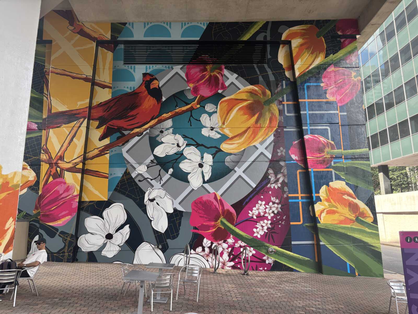 Selfie-friendly mural with colorful local symbols completed in Rosslyn