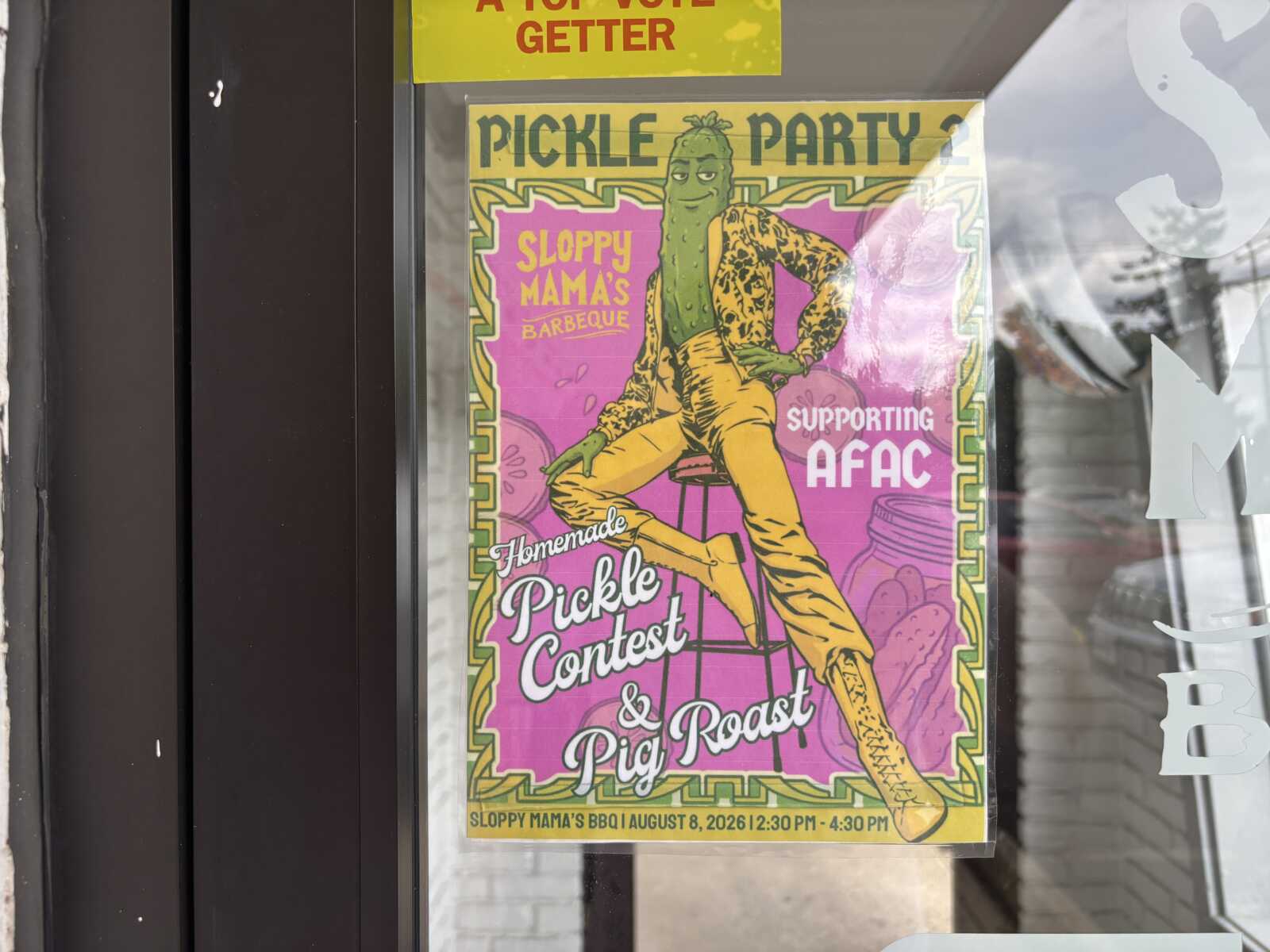 Poster advertising a Pickle Party at Sloppy Mama's BBQ, featuring a green pickle mascot on a pink and yellow design with text about a Homemade Pickle Contest and Pig Roast.