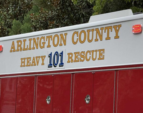 Arlington County Heavy Rescue 101 emergency vehicle with gold lettering and red compartment doors