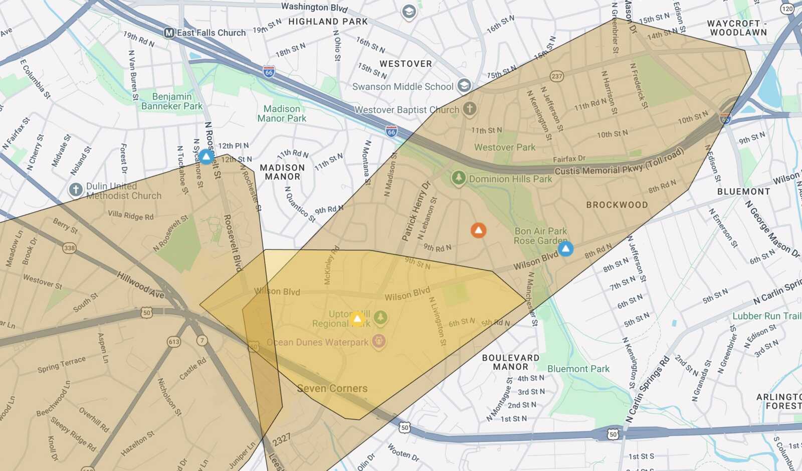 Map showing overlapping brown and yellow polygons outlining zones across a city neighborhood with location markers nearby Uptown and Brookwood etc.