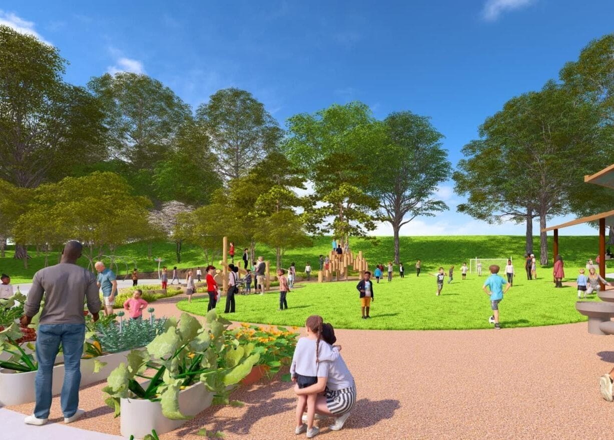 People enjoying a sunny day in a community park: kids playing on a grassy field, adults chatting, and trees lining the area.