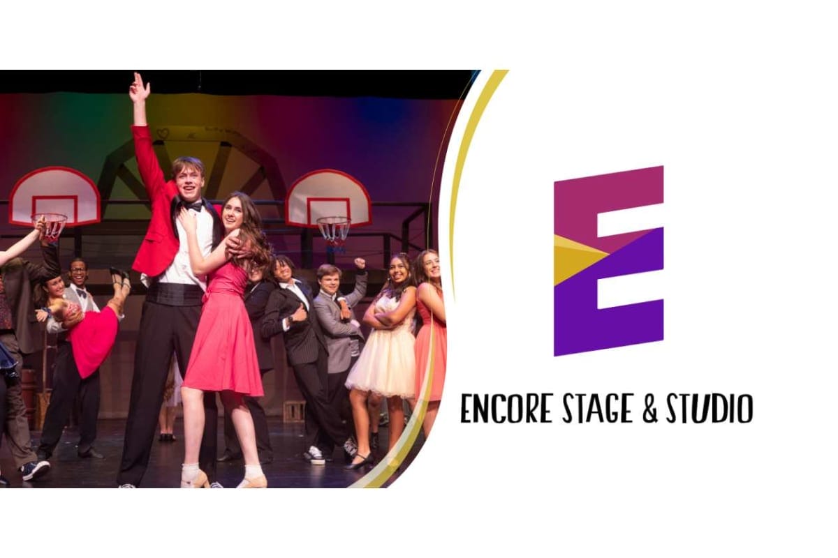 Group of young performers dancing on a stage with a colorful backdrop and the Encore Stage & Studio logo on the right