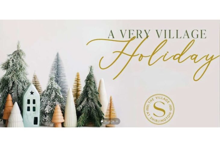 Holiday-themed banner with frosted miniature Christmas trees and gold script reading 'A Very Village Holiday'