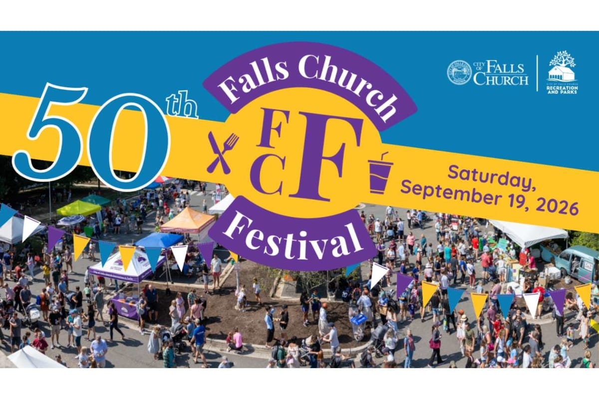 Overhead view of a crowded street festival with colorful bunting, tents, and a large sign reading '50th Falls Church Festival'.