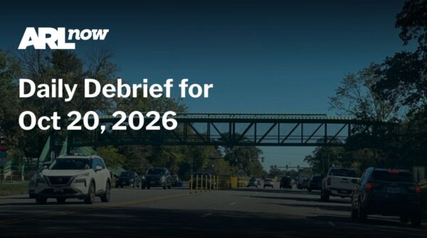 ARL Now banner: Daily Debrief for Oct 20, 2026 over a busy city street with cars and a pedestrian bridge on a blue sky day