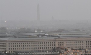 The Washington Monument seen in the background of the Pentagon during Hurricane Sandy Monday morning