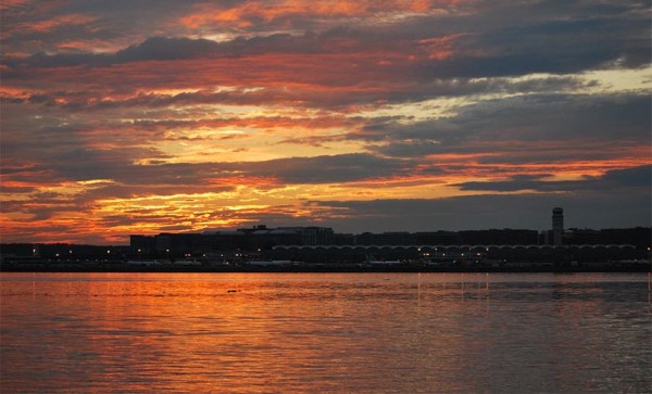 Sunset over Reagan National Airport (Flickr pool photo by Sunday Money)
