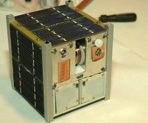 A CubeSat device (photo via Wikipedia)