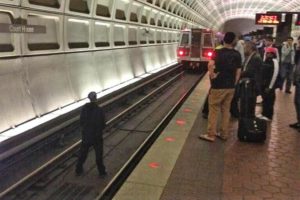 Man on the track at the Courthouse Metro station (photo via @mikekap3)