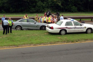 Overturned car on GW Parkway (courtesy of MWAA)